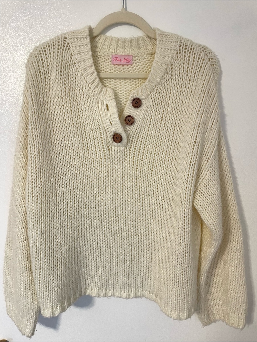 Cream chunky acrylic knit sweater with wooden button details Pink Lily